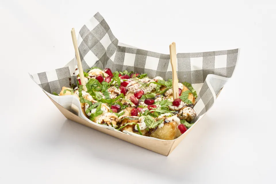 Halloumi Me loaded dish with pomegranate, mint and zaatar yoghurt